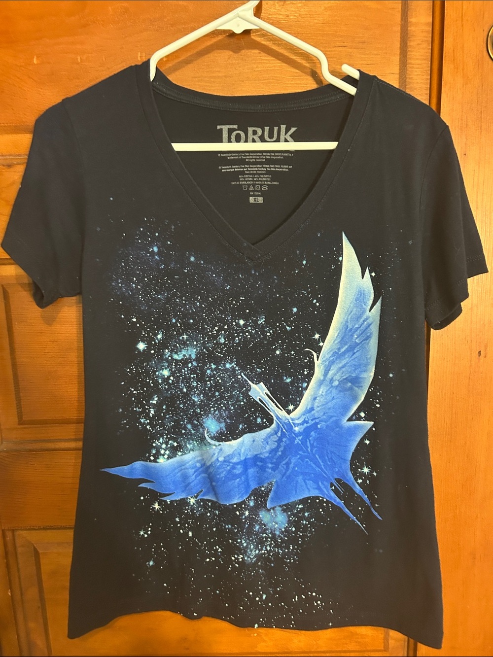 Women's Navy V-Neck Tee with Blue Graphic Toruk The First Flight